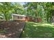 Charming single-story home with a brick facade and well-manicured lawn at 800 Davenport St, Monroe, NC 28112
