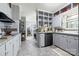Updated kitchen features stainless steel appliances, granite countertops, and stylish cabinets at 800 Davenport St, Monroe, NC 28112