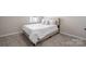 Bedroom with carpet, neutral walls, and a queen bed at 8928 Morning Mist Rd, Charlotte, NC 28215