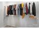 Walk-in closet featuring metal shelving and hanging rods for optimal organization at 8928 Morning Mist Rd, Charlotte, NC 28215