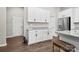 Bright kitchen with white cabinets, stainless steel appliances, granite countertops, and view to the dining area at 8928 Morning Mist Rd, Charlotte, NC 28215
