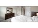 Main bedroom with a bed, dresser, carpet, and neutral walls at 8928 Morning Mist Rd, Charlotte, NC 28215