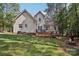 Spacious backyard featuring a wooden deck perfect for outdoor entertaining and relaxation at 134 Lake Spring Loop, Mooresville, NC 28117