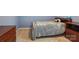 This is a cozy bedroom with neutral walls, dresser and a comfortable bed at 134 Lake Spring Loop, Mooresville, NC 28117