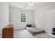 Bright bedroom featuring neutral walls, carpet and window with natural light at 134 Lake Spring Loop, Mooresville, NC 28117