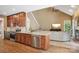 Modern kitchen with stainless steel appliances, granite countertops, and hardwood floors at 134 Lake Spring Loop, Mooresville, NC 28117