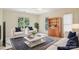 Spacious living room with an area rug and two chairs at 134 Lake Spring Loop, Mooresville, NC 28117