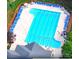 A refreshing community swimming pool with chairs for lounging and a pool house at 134 Lake Spring Loop, Mooresville, NC 28117