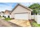 Two-car garage with level driveway and siding at 7023 Blakeney Greens Blvd, Charlotte, NC 28277