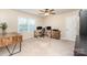 A functional office space is complete with a window and natural light at 1012 Lightwood Dr, Matthews, NC 28105