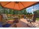 Spacious patio with covered gazebo and comfortable seating area at 1012 Lightwood Dr, Matthews, NC 28105