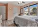 This stylish bedroom features a neutral color palette, and large windows at 1017 Quail Run Ct, Indian Land, SC 29707