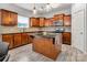 Kitchen with wooden cabinets, granite countertops, and stainless steel appliances at 1017 Quail Run Ct, Indian Land, SC 29707
