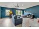 This spacious living room features a projector, recessed lighting and large windows at 1017 Quail Run Ct, Indian Land, SC 29707