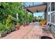 Enjoy the home's spacious patio area, perfect for entertaining and relaxing outdoors amidst lush greenery at 1017 Quail Run Ct, Indian Land, SC 29707