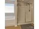 Bathroom features a glass-enclosed shower and separate soaking tub at 1017 Quail Run Ct, Indian Land, SC 29707