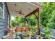 A charming patio with plants, and a backyard swing at 1017 Quail Run Ct, Indian Land, SC 29707