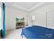 Cozy bedroom with carpeted floor, TV, neutral walls, and plenty of natural light at 104 E Louisiana Ave, Bessemer City, NC 28016