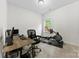 Home office with a desk, a window, an office chair, and a workout machine at 104 E Louisiana Ave, Bessemer City, NC 28016