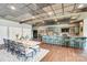 Entertaining basement features dining area, a bar, and wood flooring at 109 Oak Forest Dr, Kings Mountain, NC 28086