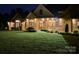Inviting exterior view of a beautiful home with stone and brick accents, trimmed bushes and front lawn at 109 Oak Forest Dr, Kings Mountain, NC 28086