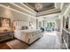 Luxurious main bedroom with tray ceiling, sitting area, and abundant natural light at 109 Oak Forest Dr, Kings Mountain, NC 28086