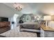 Bright main bedroom features a large bed, bedside tables, and a window at 109 Oak Forest Dr, Kings Mountain, NC 28086