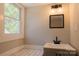 Bathroom featuring a window, vanity, mirror, and modern fixtures at 112 Hampton St, Chester, SC 29706
