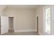 Bright bedroom with a large window and light-colored walls and laminate flooring at 112 Hampton St, Chester, SC 29706