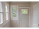 Inviting entryway featuring natural light and a modern door at 112 Hampton St, Chester, SC 29706
