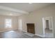 Cozy living room featuring a decorative brick fireplace, recessed lighting, neutral paint, and modern, durable flooring at 112 Hampton St, Chester, SC 29706