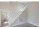 Well-lit staircase with white banister and classic design at 112 Hampton St, Chester, SC 29706