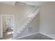 Well-lit staircase with white banister and classic design at 112 Hampton St, Chester, SC 29706