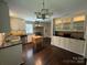 Well-lit kitchen features stainless steel appliances, dark countertops, and sleek cabinetry at 121 33Rd Ne Ave, Hickory, NC 28601
