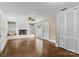 Inviting living room with a fireplace, built-in shelves, hardwood floors, and natural light at 121 33Rd Ne Ave, Hickory, NC 28601