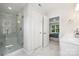 Bathroom view showcasing a glass shower, double doors, and double sink vanity at 126 Meadow Glen Dr, Troutman, NC 28166