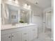 Bathroom with double sink vanity, glass shower, and view of an open door at 126 Meadow Glen Dr, Troutman, NC 28166