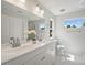 Bright bathroom showcasing a double sink vanity, toilet and natural light at 126 Meadow Glen Dr, Troutman, NC 28166