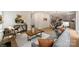 Open-concept space featuring a modern living area, a dining table, and stylish decor at 126 Meadow Glen Dr, Troutman, NC 28166