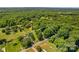 Aerial view showcases the property lines nestled within lush green trees, promising seclusion at 141 Dunlap Loop, Statesville, NC 28625