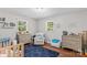 Cozy bedroom with hardwood floors, ample natural light, and neutral decor at 141 Dunlap Loop, Statesville, NC 28625