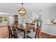 This dining area showcases a seamless transition to the kitchen and features an inviting view of the cozy living room at 141 Dunlap Loop, Statesville, NC 28625