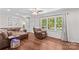 Bright living room featuring wood floors and a large window, offering an abundance of natural light at 141 Dunlap Loop, Statesville, NC 28625