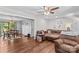 Inviting living room with hardwood floors seamlessly flowing into the adjacent dining area at 141 Dunlap Loop, Statesville, NC 28625