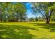 Large yard with a charming house and outbuilding, blending comfort with outdoor space and convenience at 141 Dunlap Loop, Statesville, NC 28625