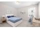 Charming bedroom with a playful teepee, shelf décor, and a cozy bed with blue accents at 14611 Murfield Ct, Charlotte, NC 28278