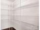 Walk-in pantry with wire shelving for ample storage at 14611 Murfield Ct, Charlotte, NC 28278