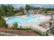 Community pool featuring a slide, various pool areas, and lounge seating at 14611 Murfield Ct, Charlotte, NC 28278