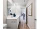 Modern bathroom featuring double sink vanity, and wood floors at 1511 River Cane St, Edgemoor, SC 29712