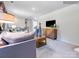 Open-concept living area with modern furnishings, a TV, and ample space for relaxation at 1511 River Cane St, Edgemoor, SC 29712